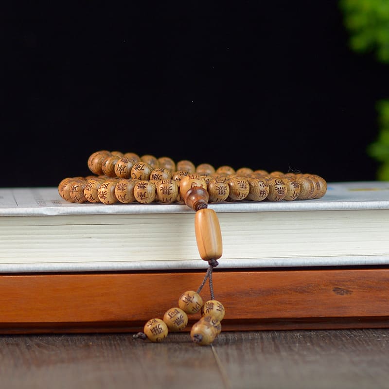 Cuentas de mala de madera hechas a mano, talladas con mantras sagrados para la meditación