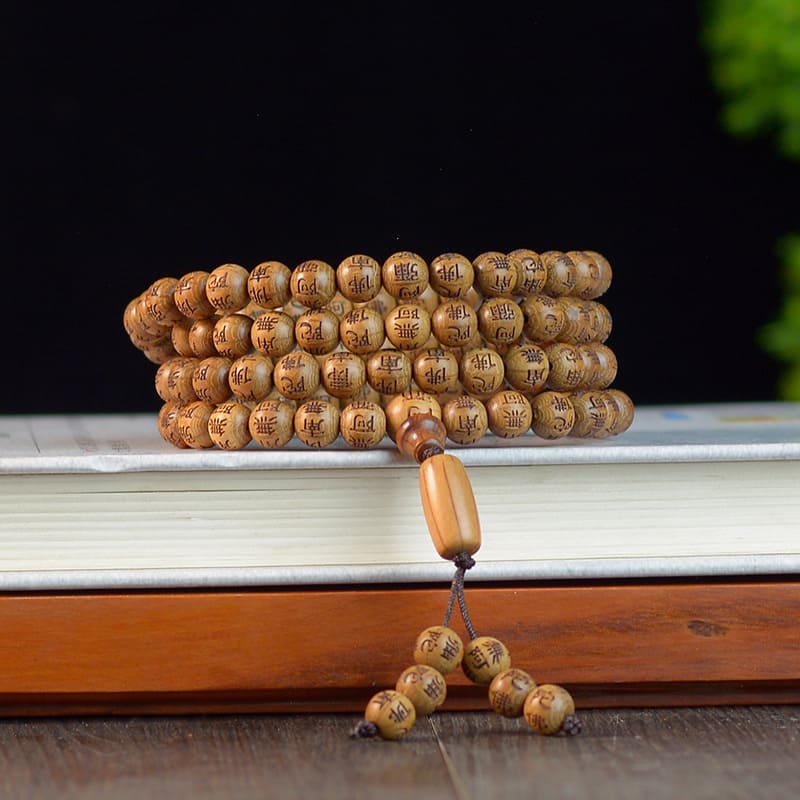 Cuentas de mala de madera hechas a mano, talladas con mantras sagrados para la meditación